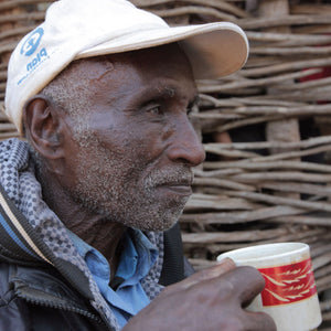 Sidama ethiopia coffee farmer drinking coffee